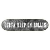 Skateboard deck with "Gotta Keep On Rollin" text in a white, weathered university font, stretched horizontally from end to end on a background of GKOR's Satellite Terrain Camo pattern in the Concrete Jungle colorway.